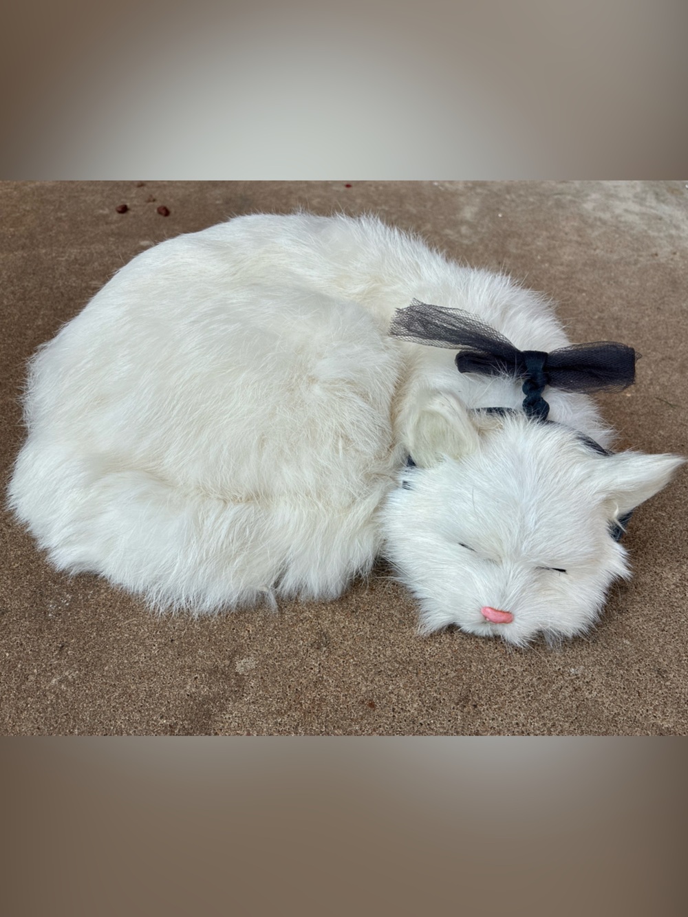White Faux Fur Sleeping Cat